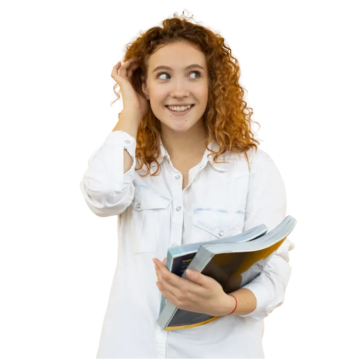Smiling student holding university books
